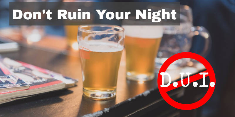 Two glasses of beer on a table with the words " don 't drink."